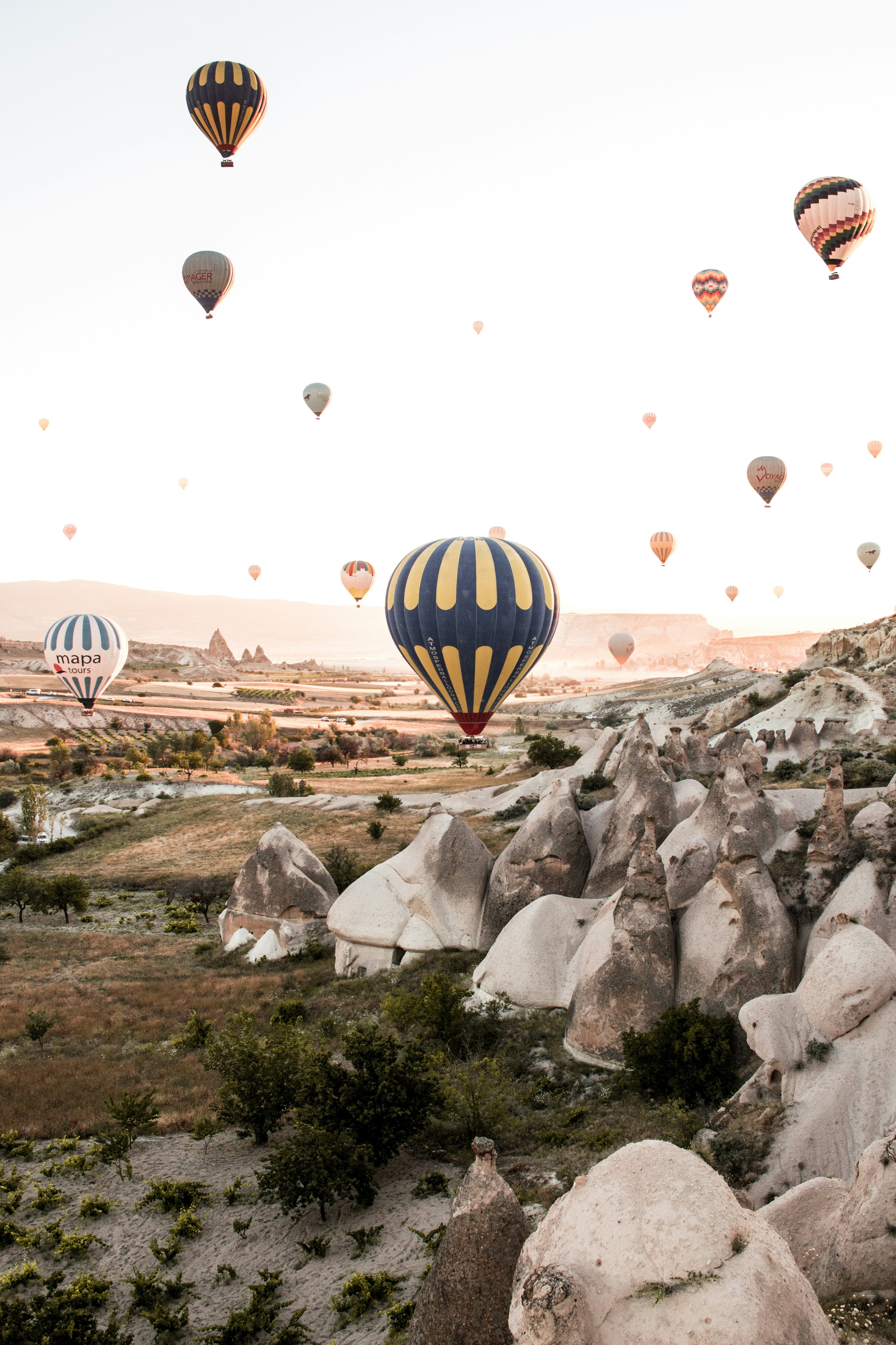 hero · balloons over göreme, dawn, first light on fairy chimneys